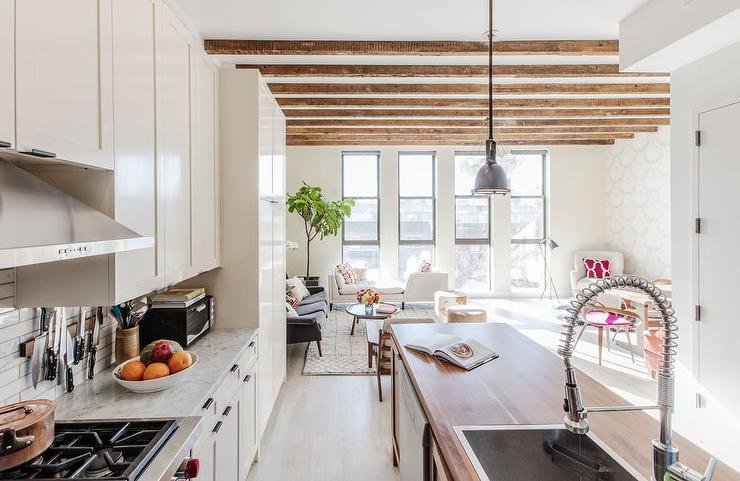kitchen-wall-mount-magnetic-knife-rack-next-to-stove